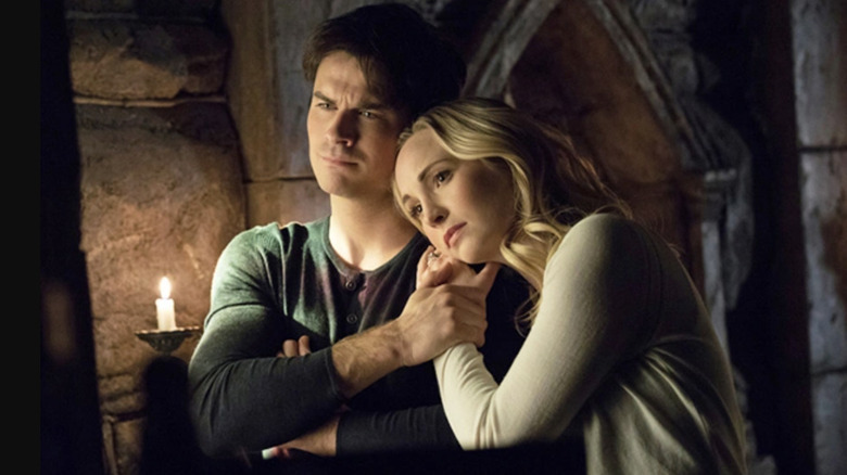 Damon and Caroline grieve