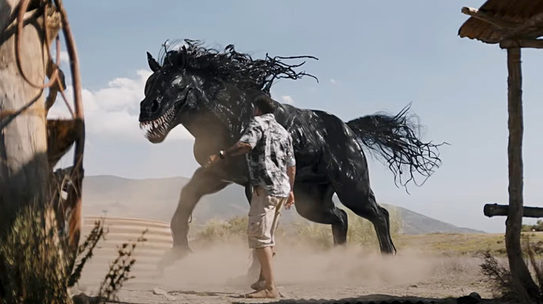 Eddie Brock with a Venom horse