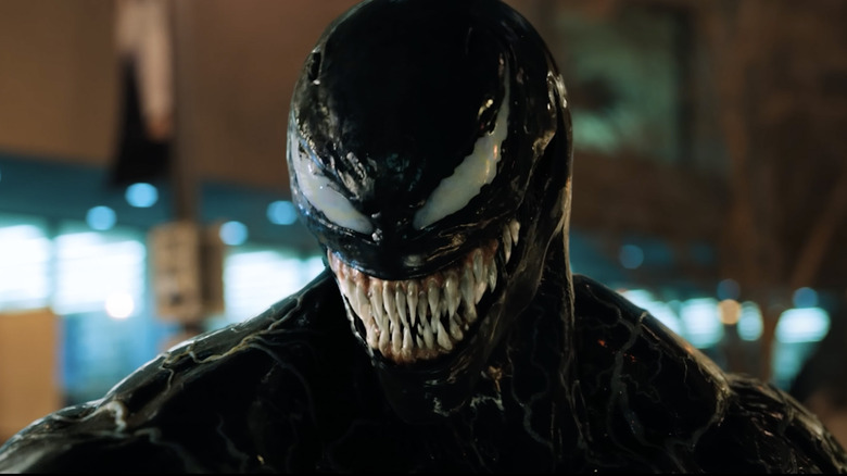 Venom smiling about to eat