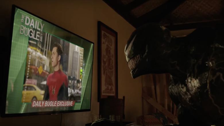 Venom watching Spider-Man on screen