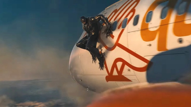 Venom riding on an airplane