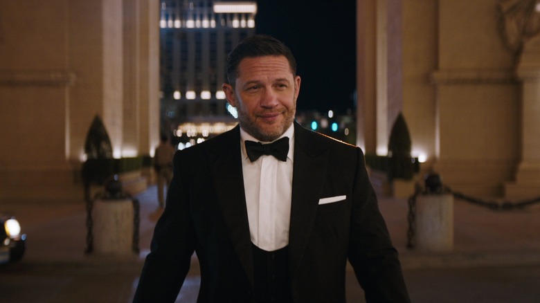 Eddie Brock smirking in tux