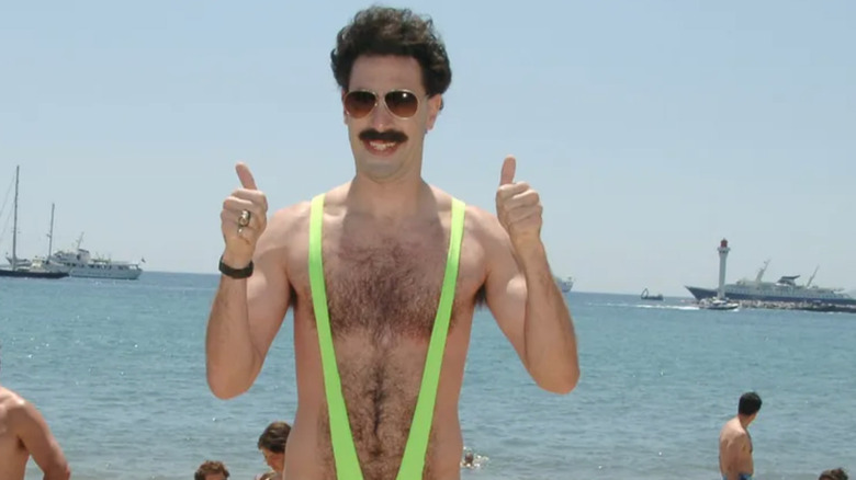 Borat giving thumbs up on the beach