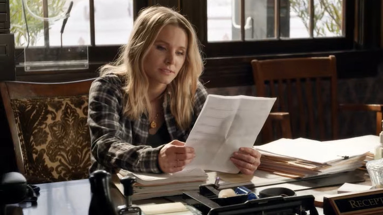 Veronica Mars reading papers