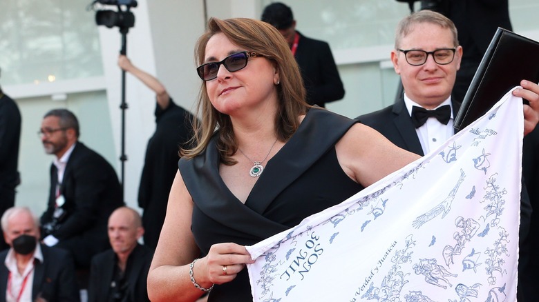 Victoria Alonso smiling on the red carpet at the Venice Film Festival