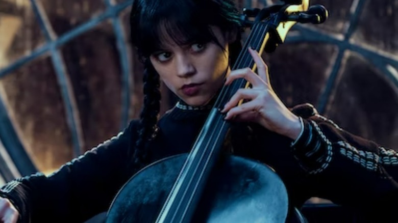 Wednesday Addams playing the cello