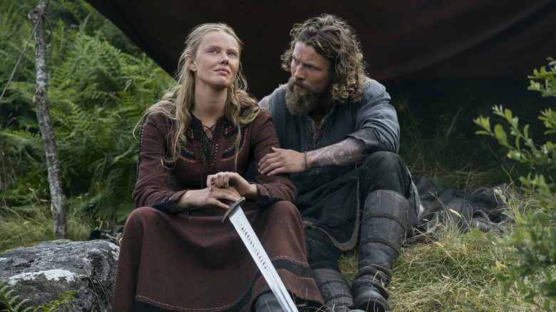 Freydis and Harald sitting on ground in Vikings: Valhalla