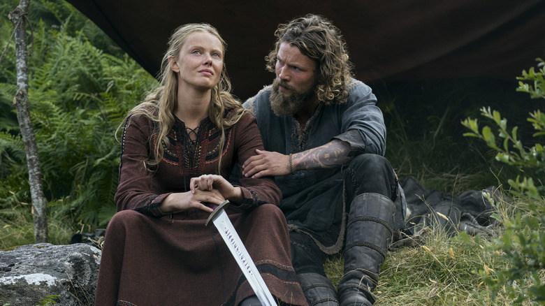 Freydis and Harald sitting on rock in Vikings: Valhalla