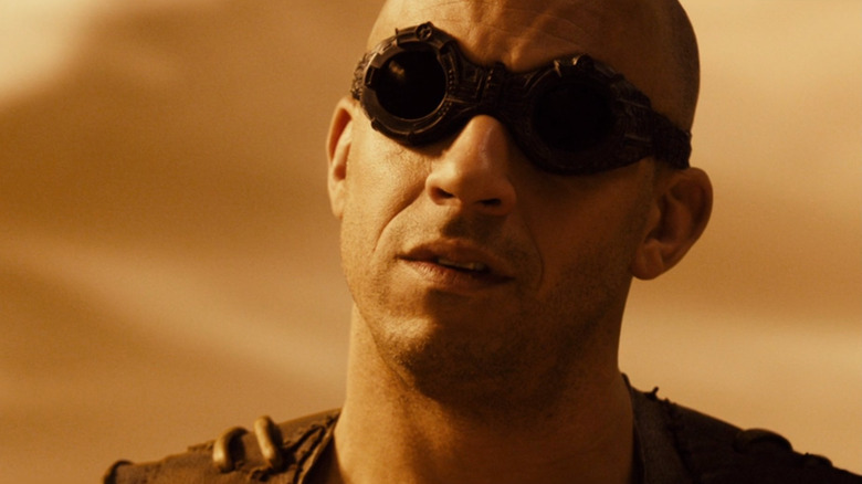 Vin Diesel as Richard Riddick with glasses