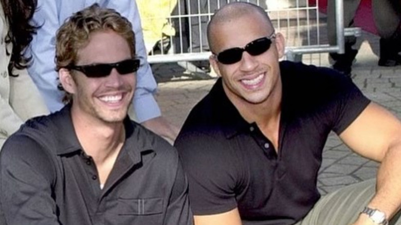 Paul Walker and Diesel smiling in sunglasses