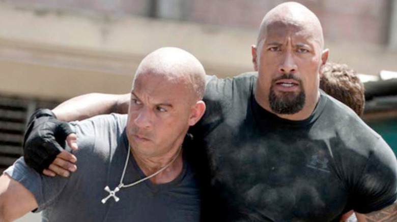 Dom Toretto helping Luke Hobbs walk