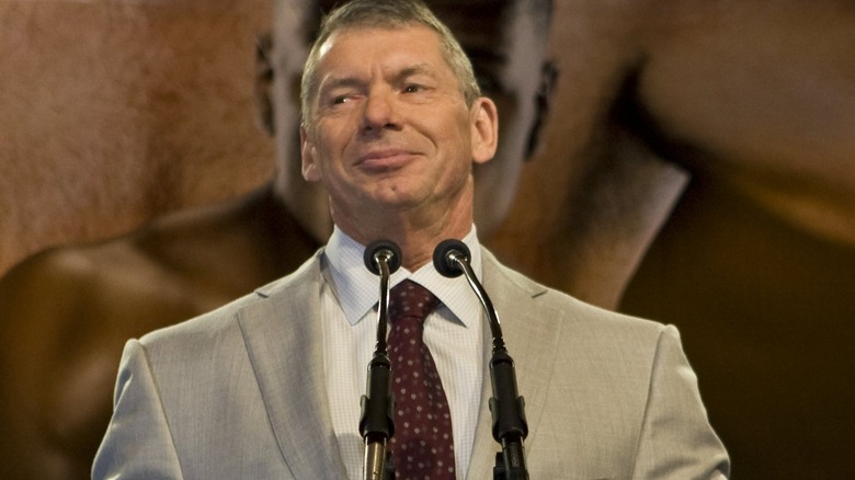 Vince McMahon holding a press conference