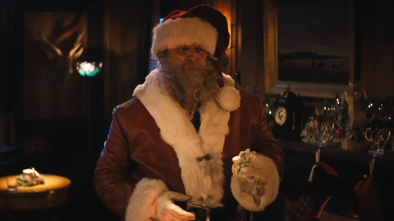 Santa eats a cookie