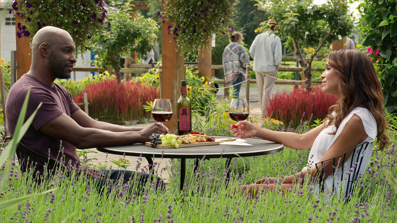 Preacher and Julia eating in garden