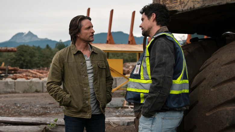 Jack talking to Brady outside at the lumber yard