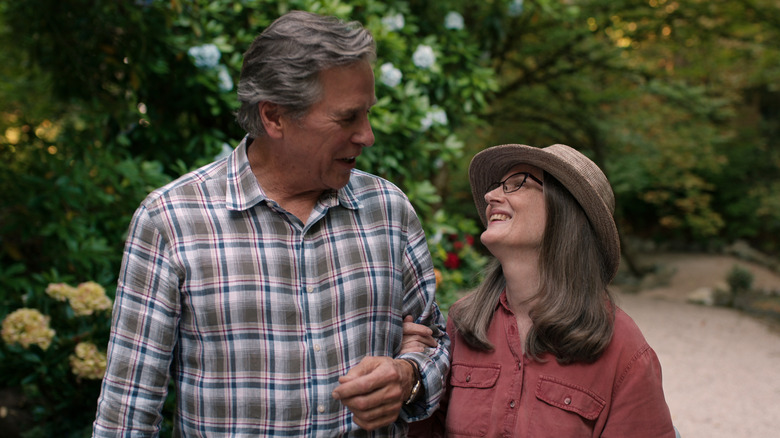 Doc and Hope walking outside arm in ar