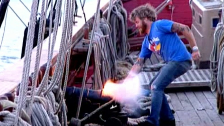 Ryan Dunn lighting a cannon