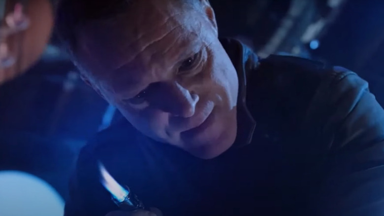 Voight threatening criminal with torch