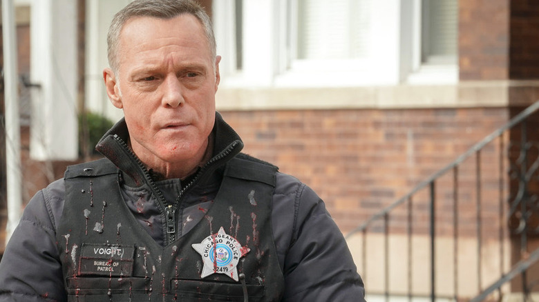 Hank Voight splattered with blood