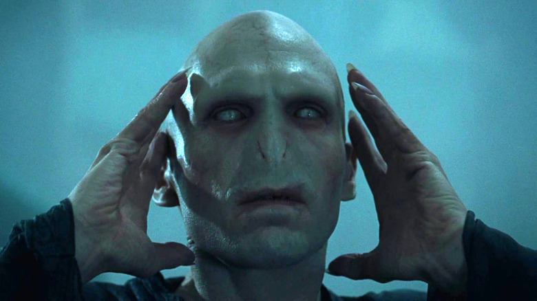 Voldemort caressing his own face