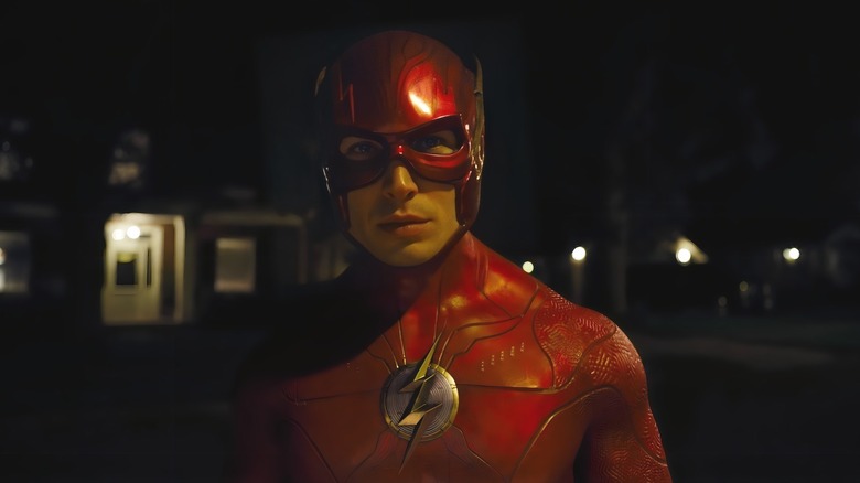 The Flash standing on dark street