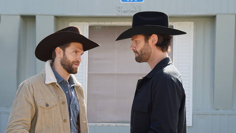 Cordell and Liam glaring in cowboy hats