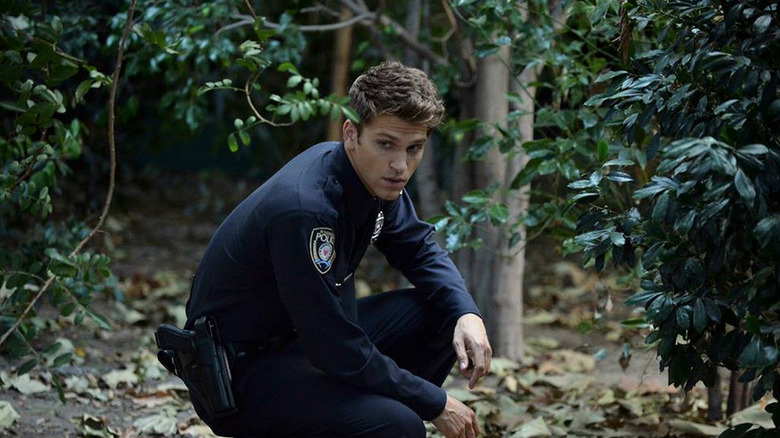 Toby in police uniform