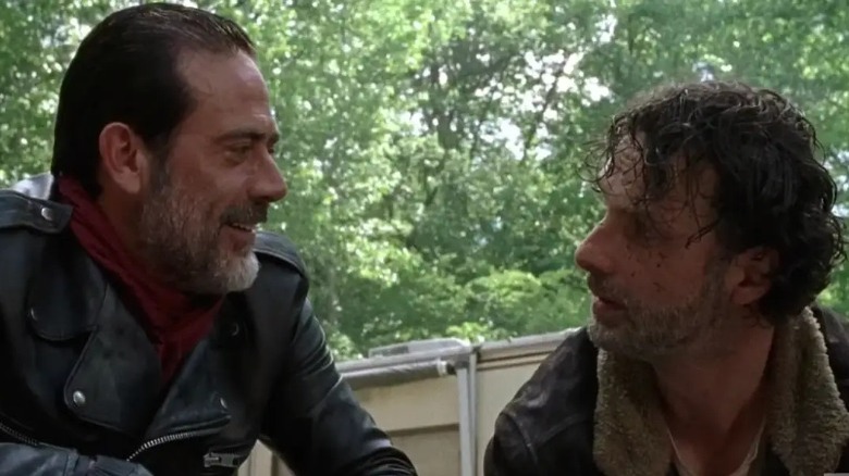 Negan smiling at Rick Grimes