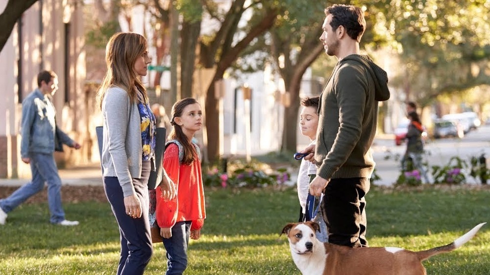 Kate and Eric with Sophia, Owen, and dog Bruce in park