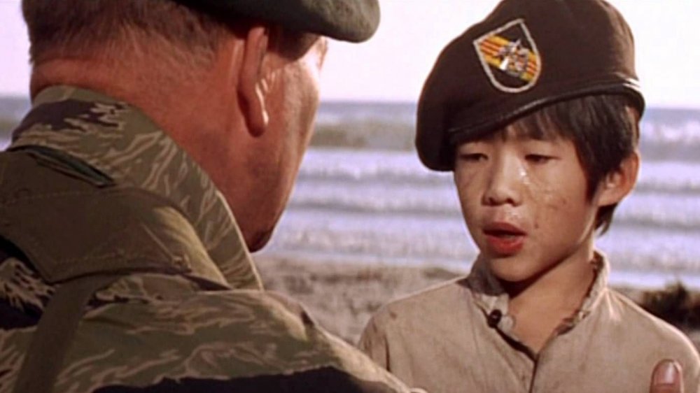 Col. Mike Kirby consoles a young boy