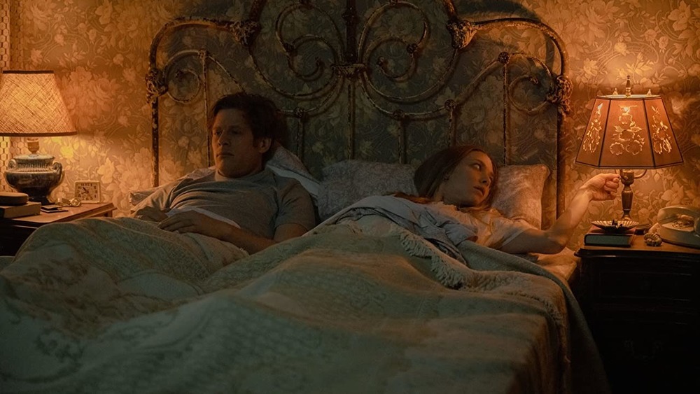 Norton and Seyfried in bed