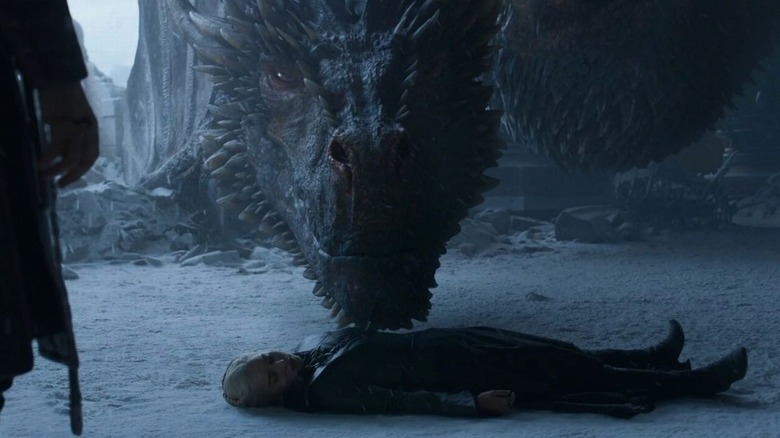 Drogon sniffs Daenerys' body