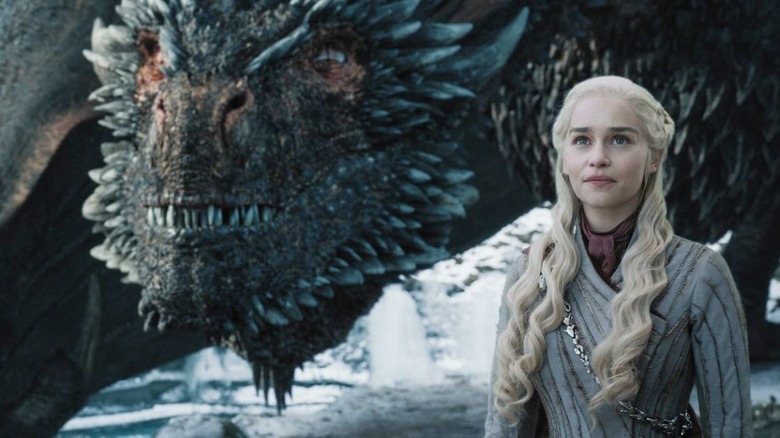 Smiling Daenerys and Drogon in snow