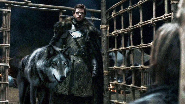 Robb Stark and Grey Wind intimidate Jaime Lannister