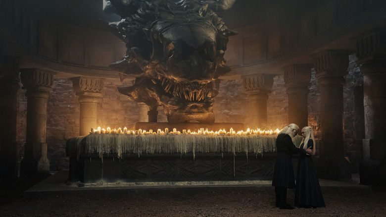 Viserys and Rhaenyra talk by Balerion's skull