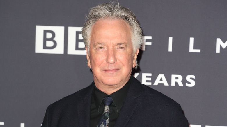 Alan Rickman posing at the BBC Films' 25th Anniversary Reception (2015)