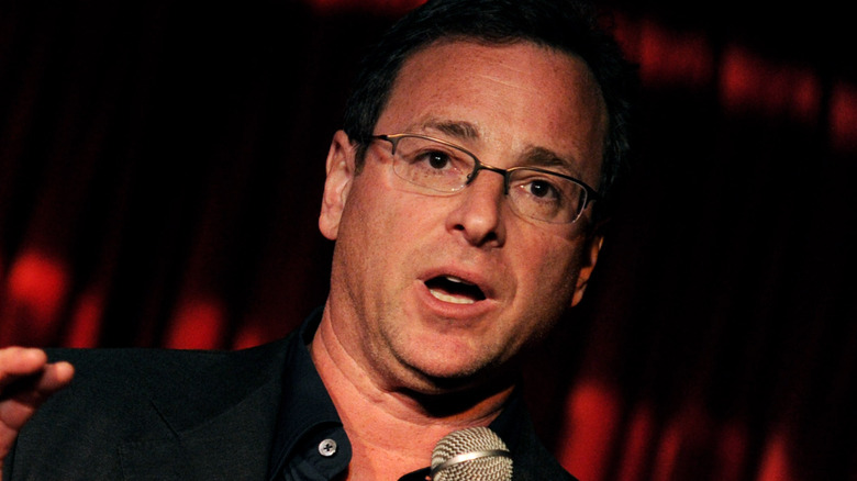 Saget performing stand up comedy