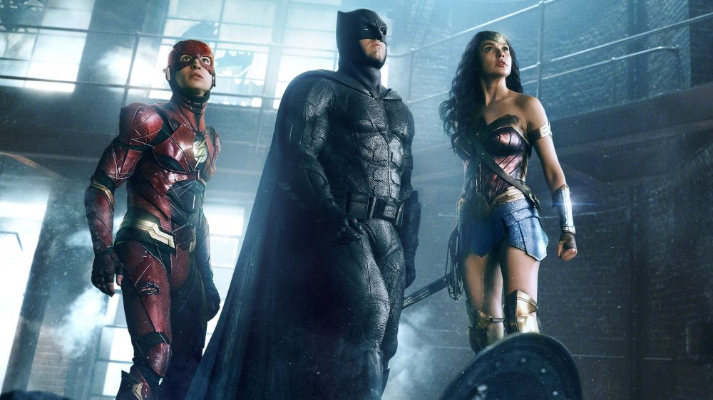 Ezra Miller as the Flash, Ben Affleck as Batman, and Gal Gadot as Wonder Woman in Justice League