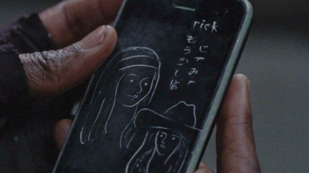 Michonne finds an iPhone