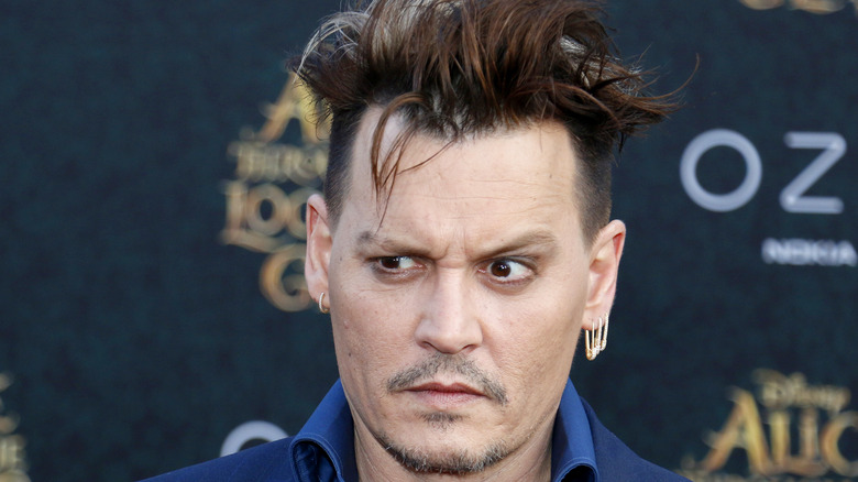 Johnny Depp pulling a face at a premiere