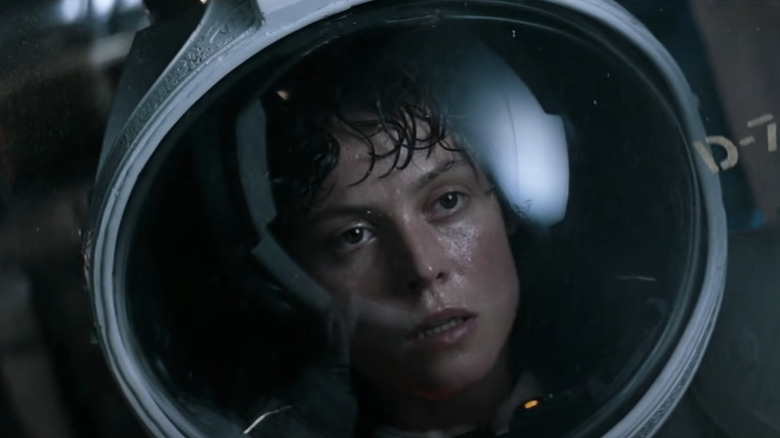 Ripley wearing astronaut helmet