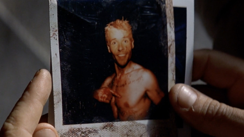 The polaroid of Leonard after his revenge