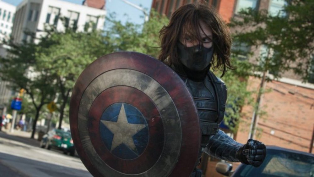 Bucky Barnes (Sebastian Stan) holds Captain America's shield