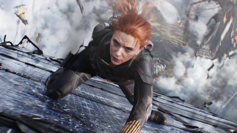 Black Widow falling out of the sky on debris