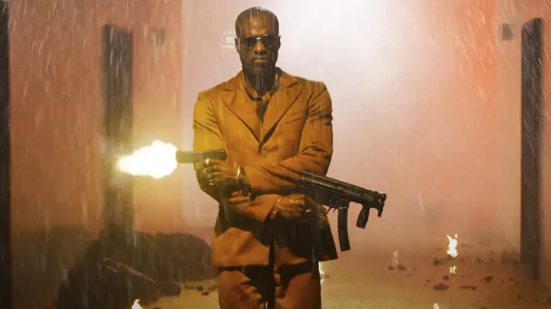 Morpheus wielding two guns