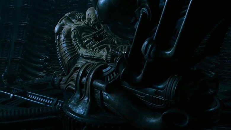 Space jockey corpse in chair