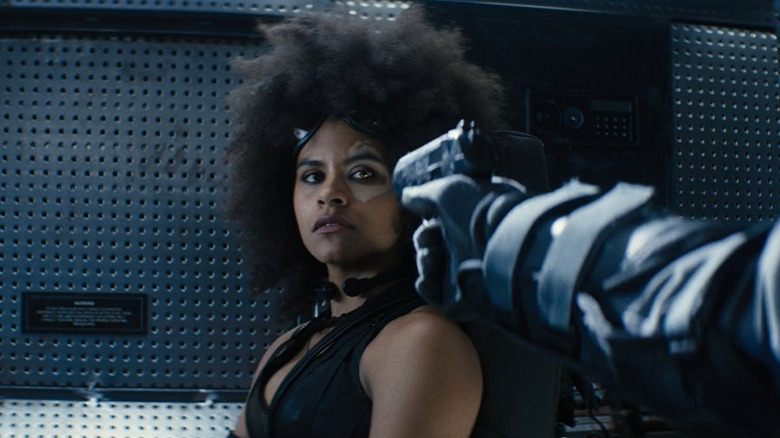 Domino being threatened by gun