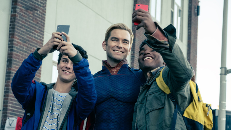 Homelander takes a selfie with boys