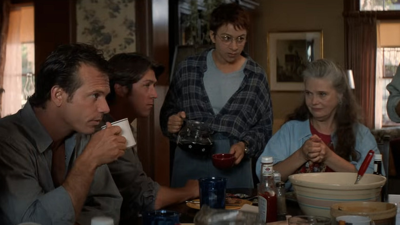 Group eating breakfast at farmhouse