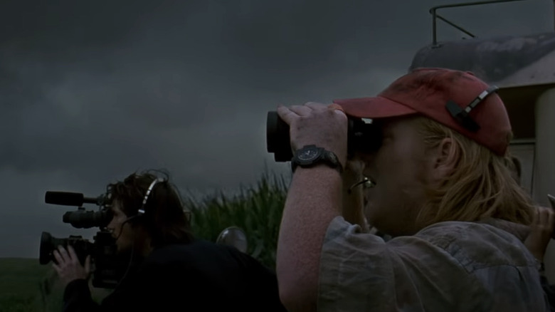 Camera woman and Dustin binoculars